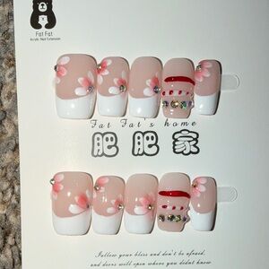 Floral Nail Art Set with Pink and White Accents